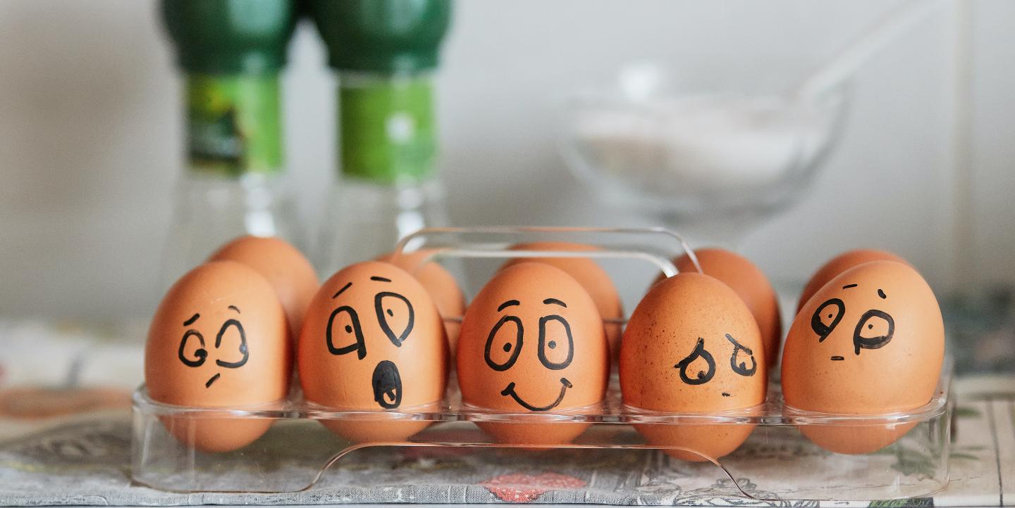 Eggs painted to show a variety of emotions