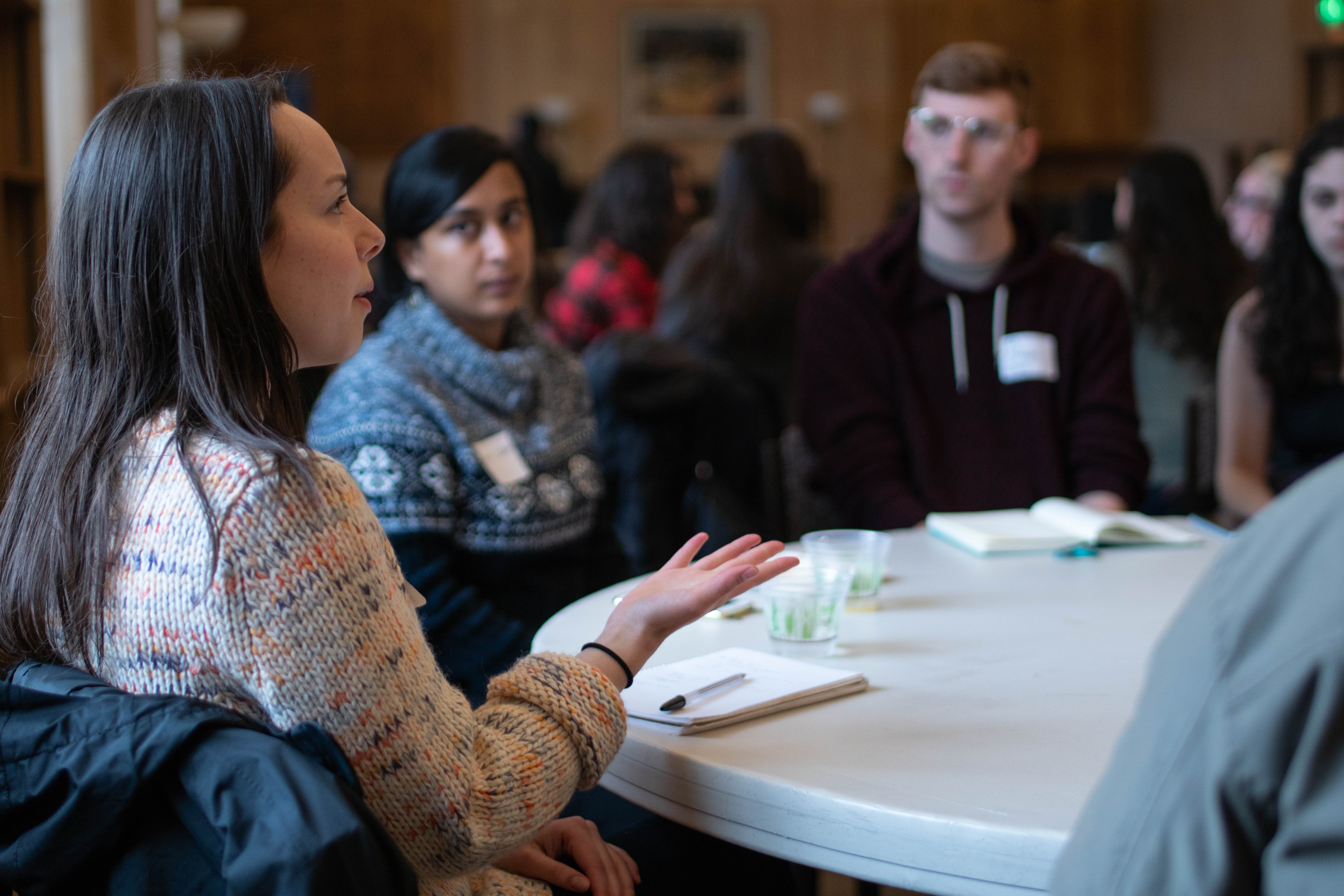 Discussion table led by Isabella Garcia. 