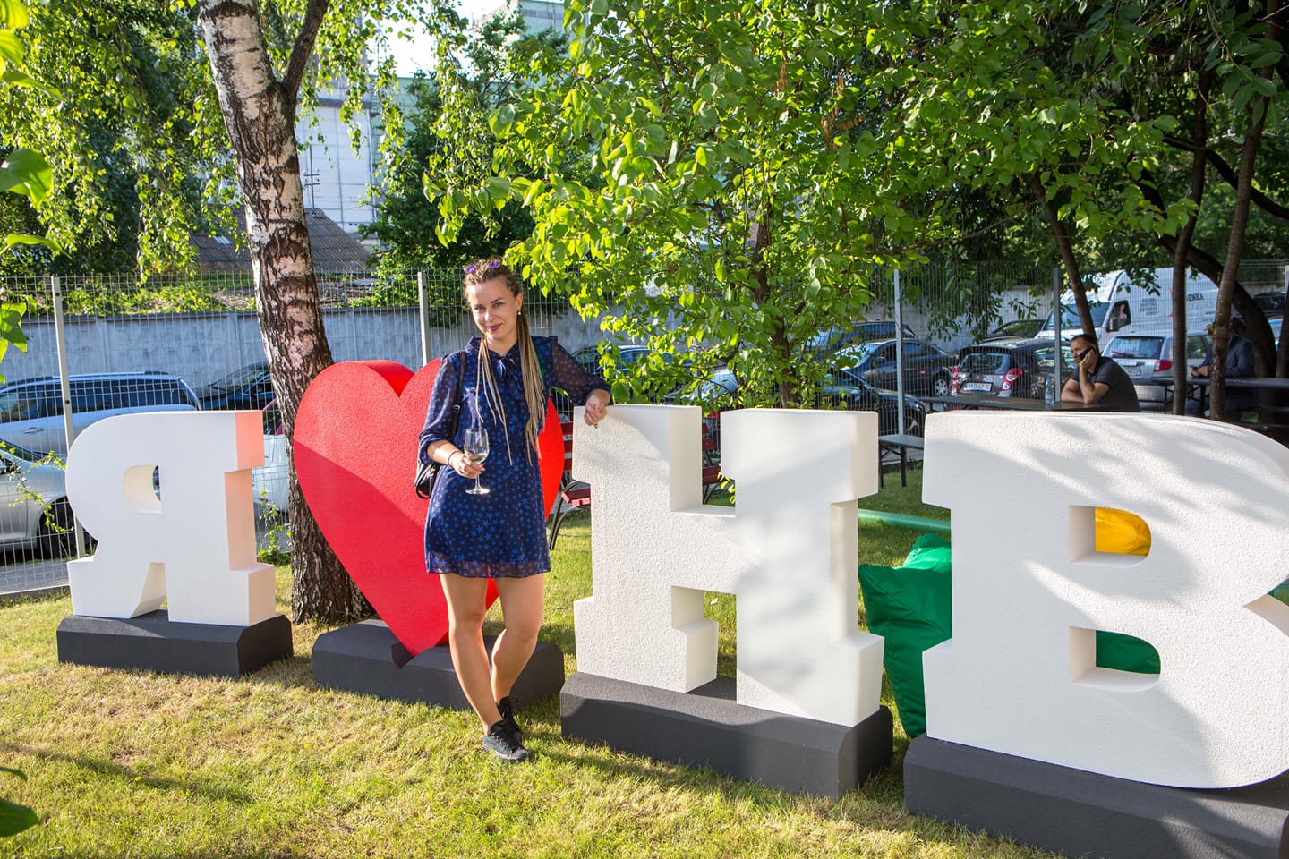 Horchynska in front of a sign for her news organization.