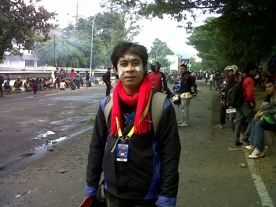 Arpan Rachman while covering student protests