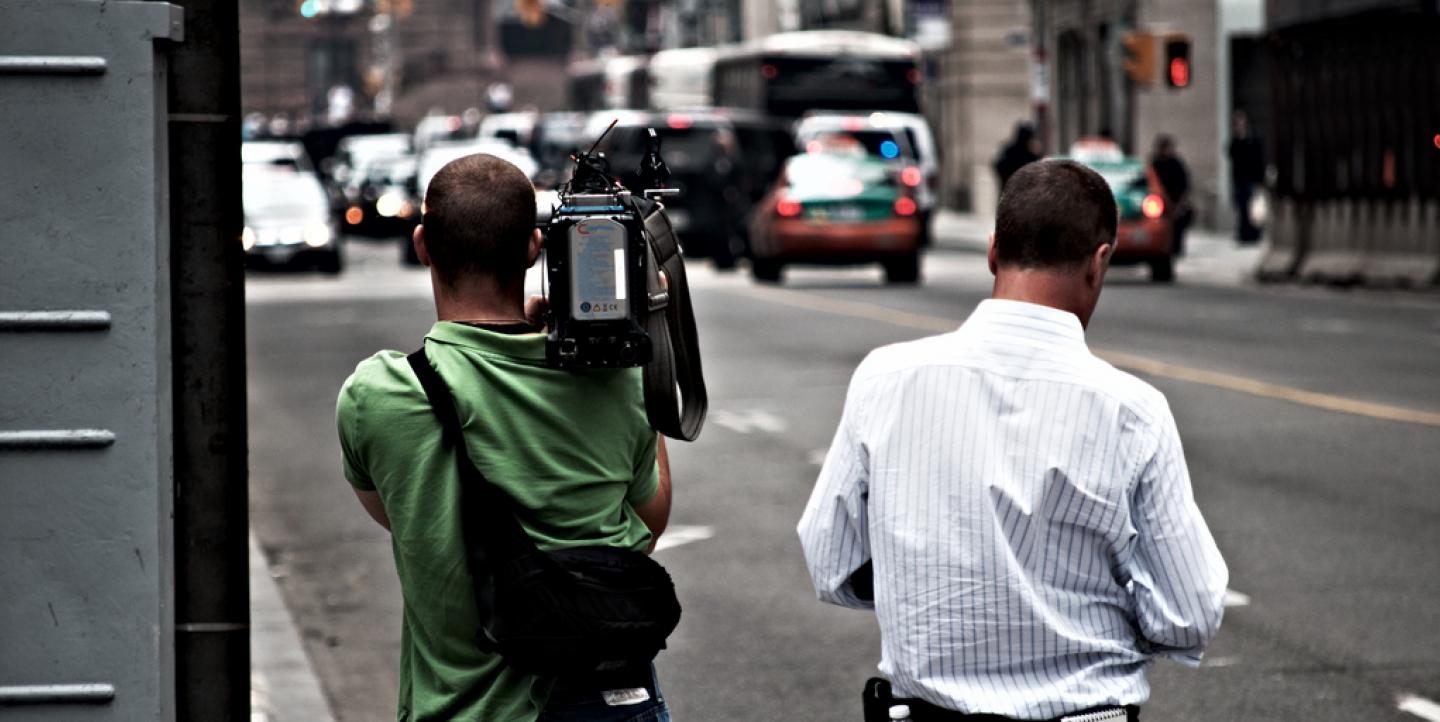 Reporters on street