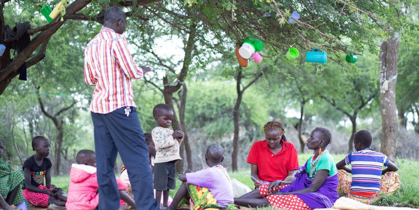 Okeyo conducts an interview with mothers in Kacheliba hospital in arid West Pokot County