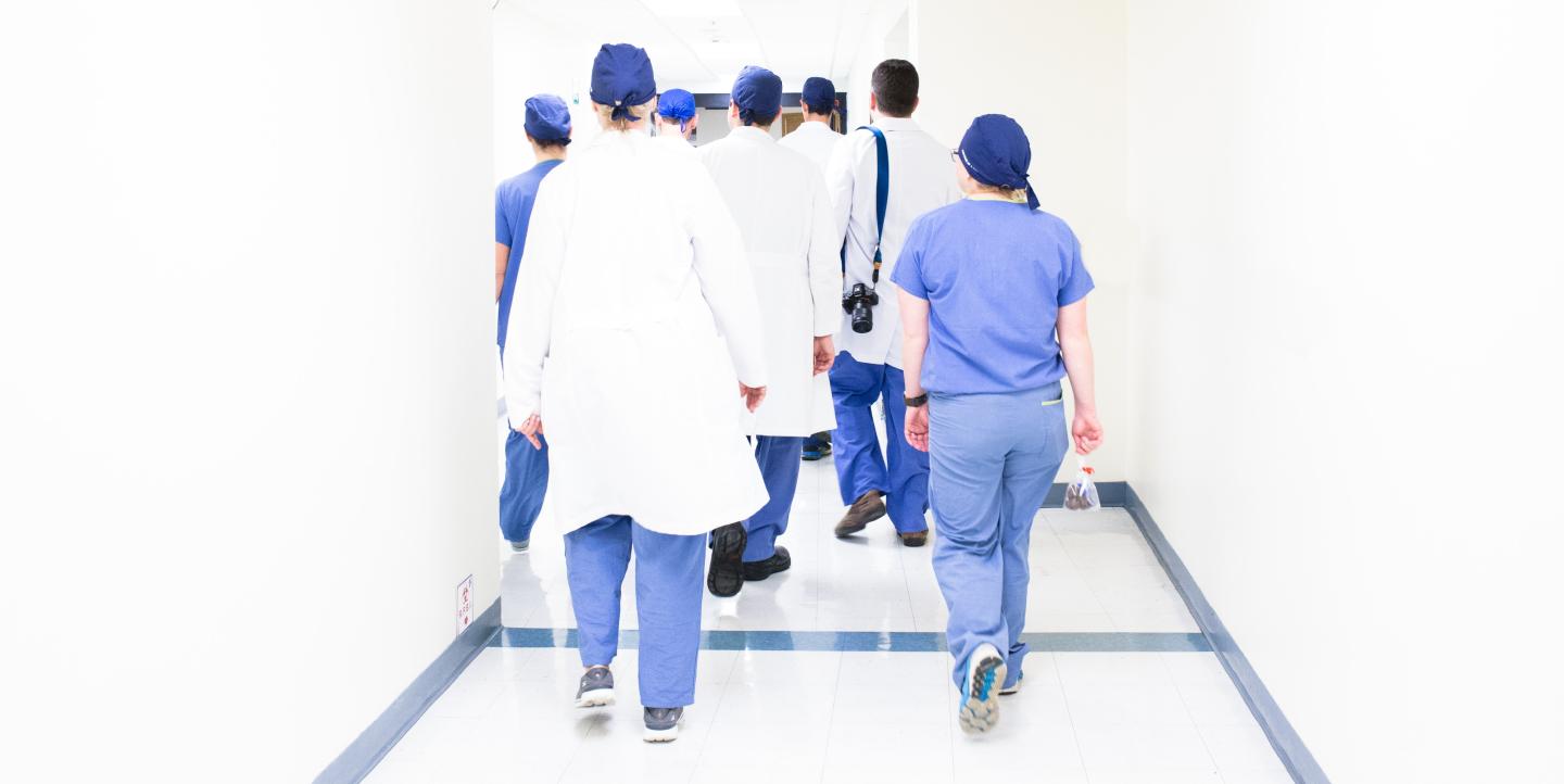 Nurses and doctors walking. 