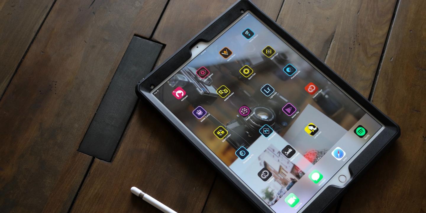Ipad with apps displayed on the screen.