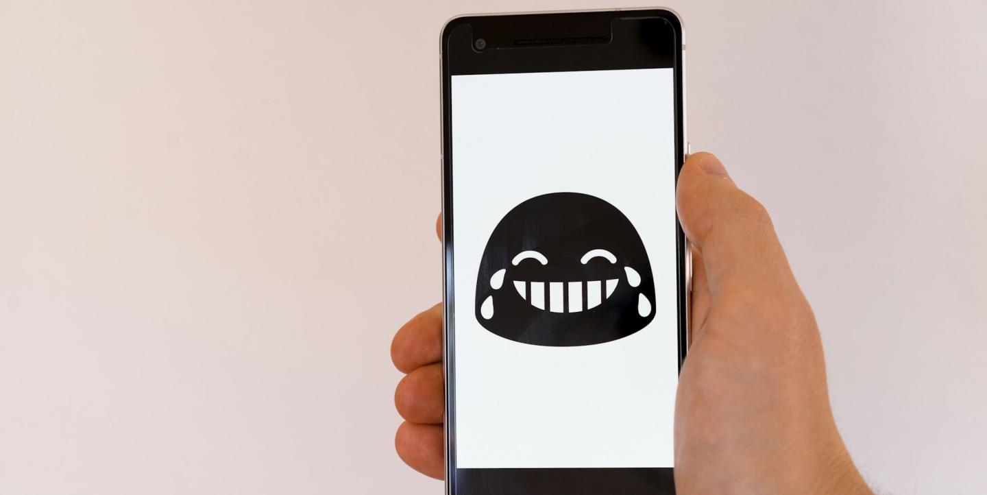Téléphone avec un smiley