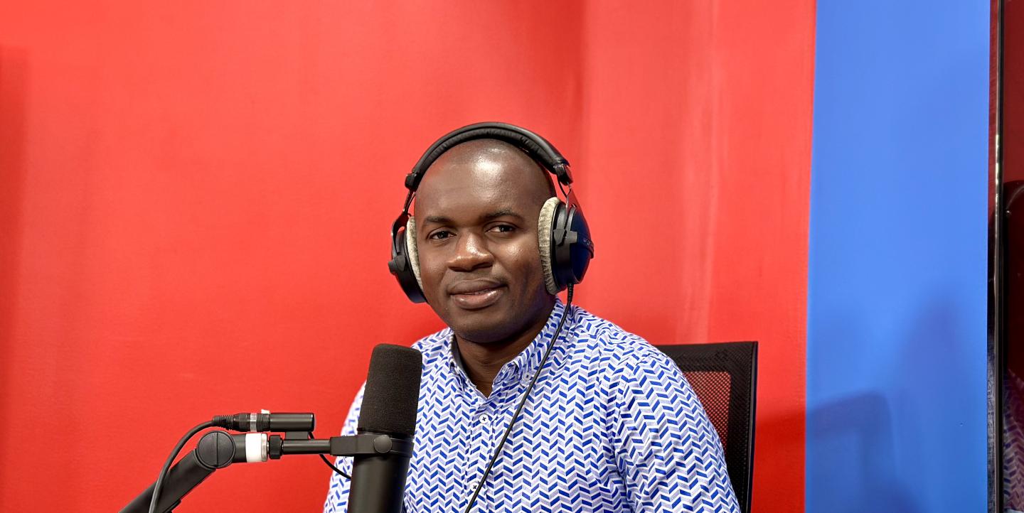  Facely Konaté with headphones and a microphone.