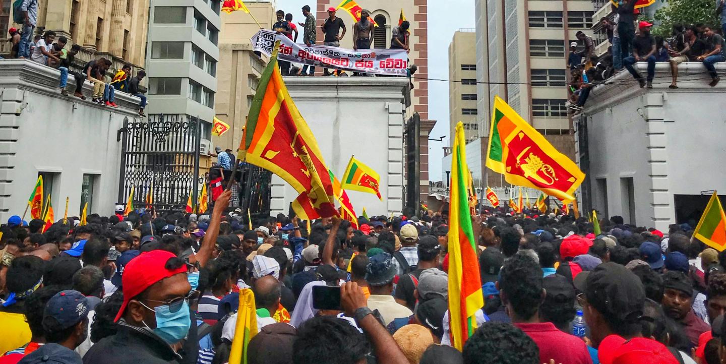 Crowd waving Sri Lanka flags