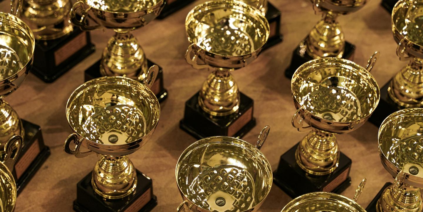 Several gold trophies.