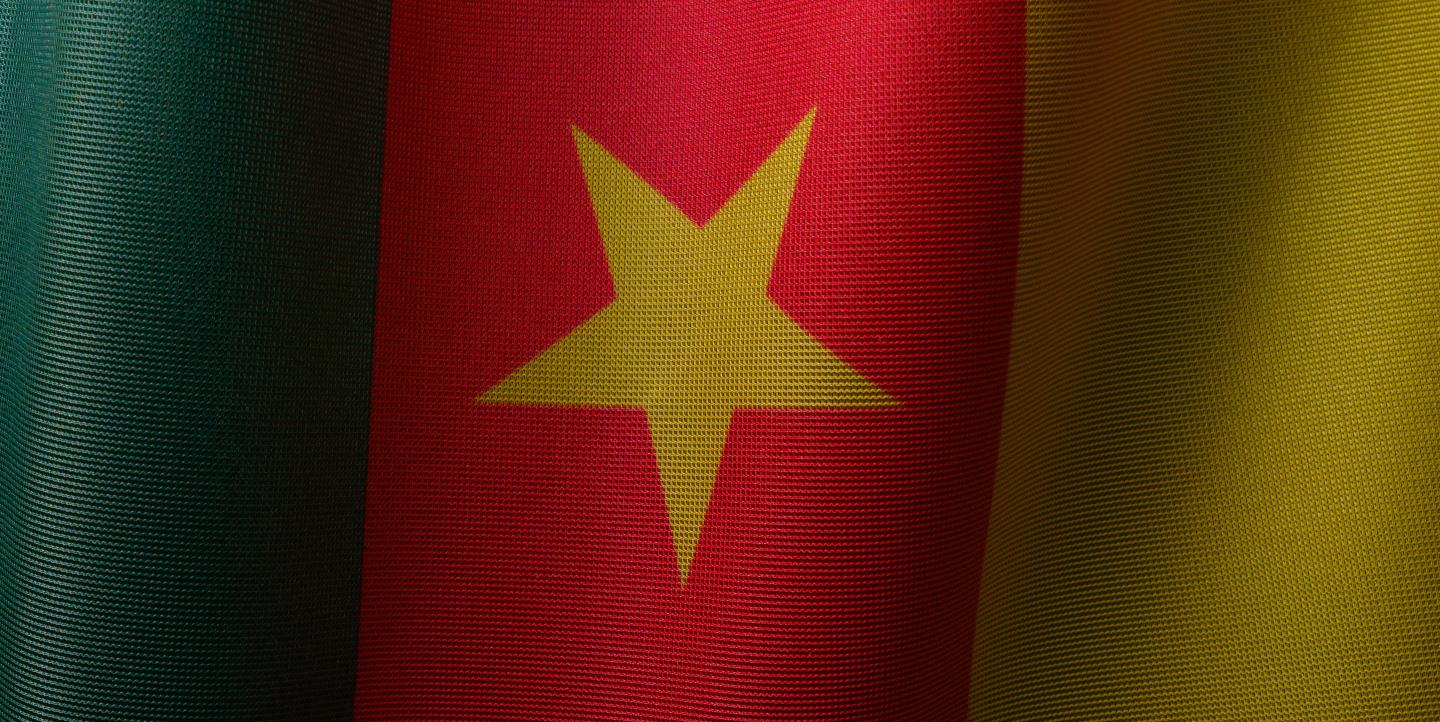 Greed red and yellow flag with yellow star on it