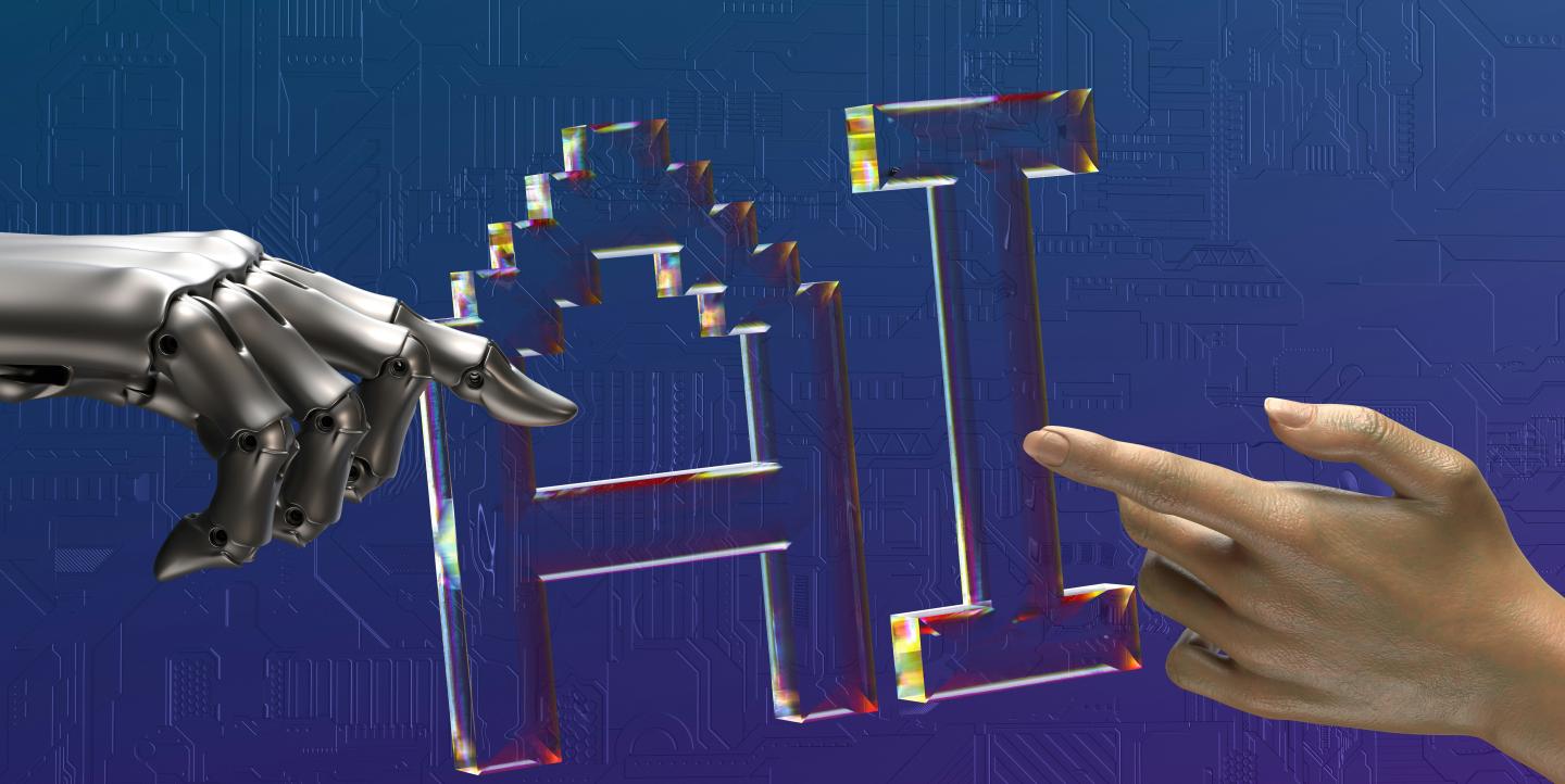 Una mano robótica y una mano humana intentando alcanzarse con "IA" en medio