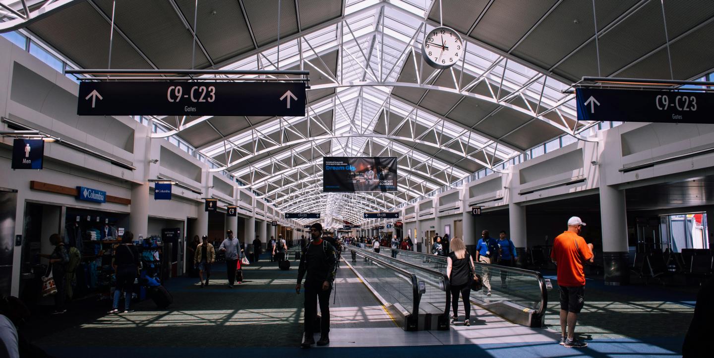 Inside of an airport where gates are located.