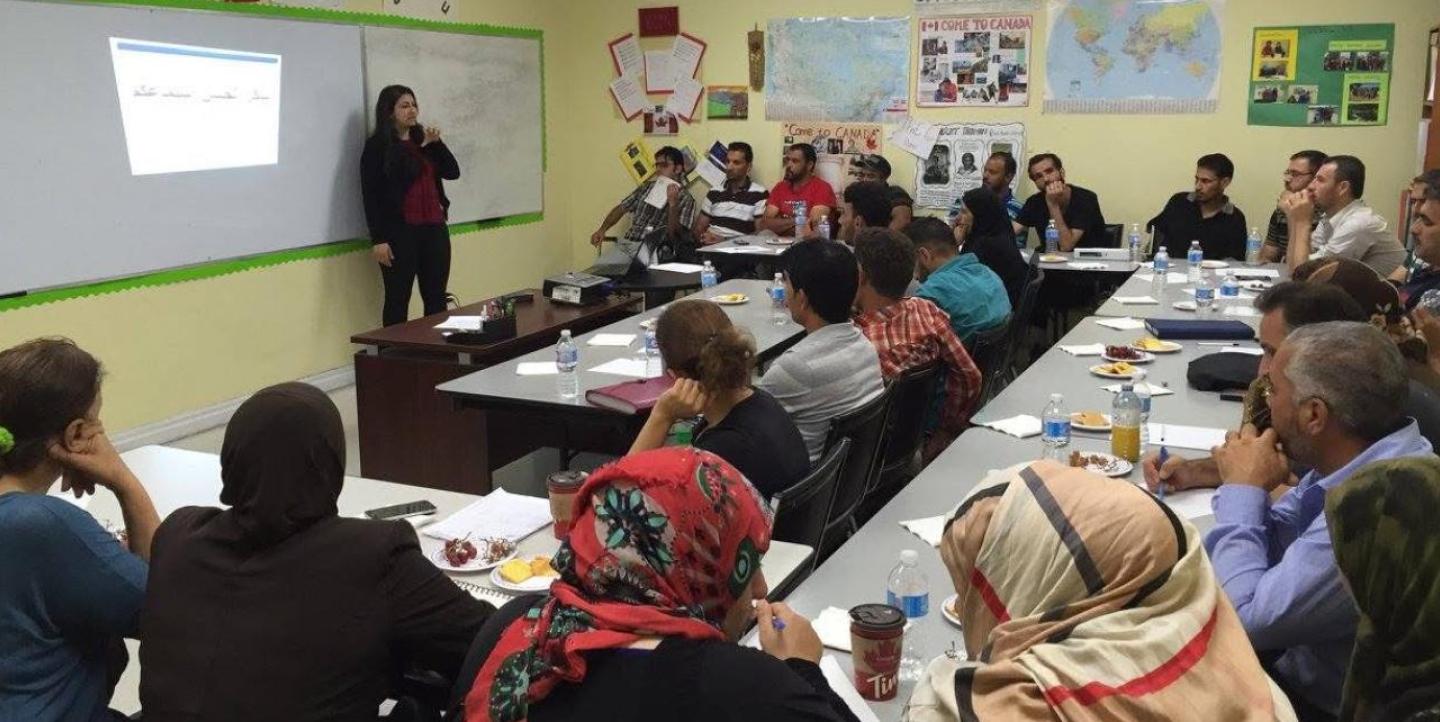 Mona teaching immigrants in Toronto.