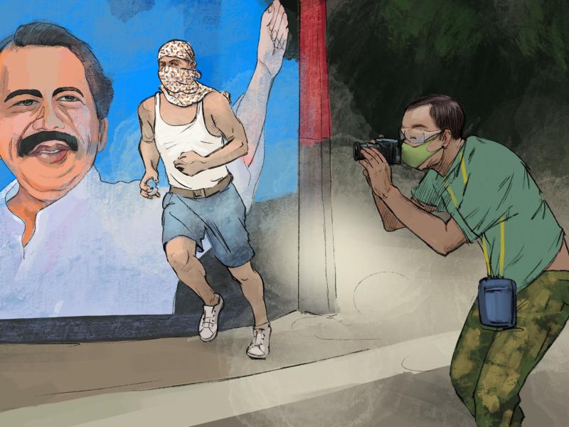 Man taking a photo of a person running in a balaclava by a mural of Nicaraguan President Ortega