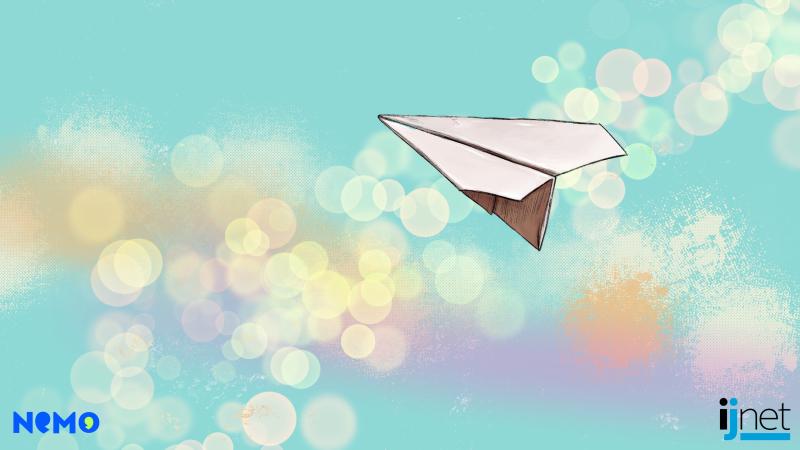 Paper airplane flying through the sky