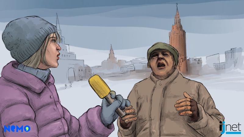 Man speaking to a reporter outside of the Kremlin in Russia