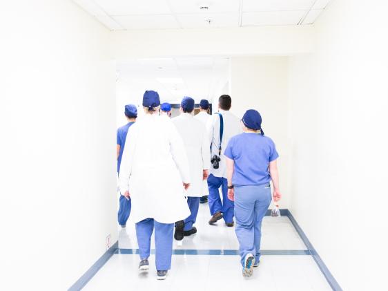 Nurses and doctors walking. 