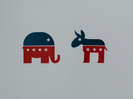 Republican elephant and democrat donkey in red white and blue