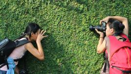 Two women photographers.