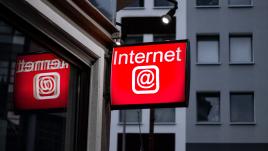 Red sign with the @ symbol and the word Internet on it. 