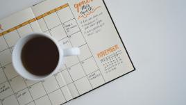 Calendar with a cup of coffee on it