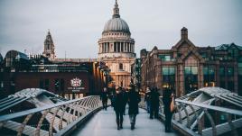 People walking on a bridge in London