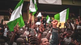 People holding NIgerian flags during a protest