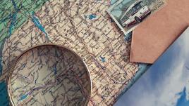 Magnifying glass over a map