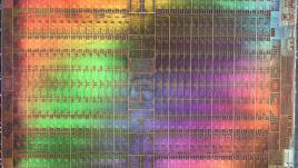 Abstract microscopic photography of a Graphics Processing Unit in rainbow colors